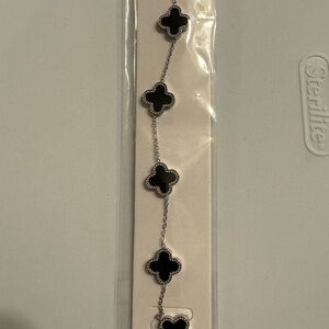 Elegant Silver and Black Clover Bracelet